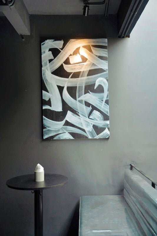 Minimalist White Calligraphy on Black Canvas